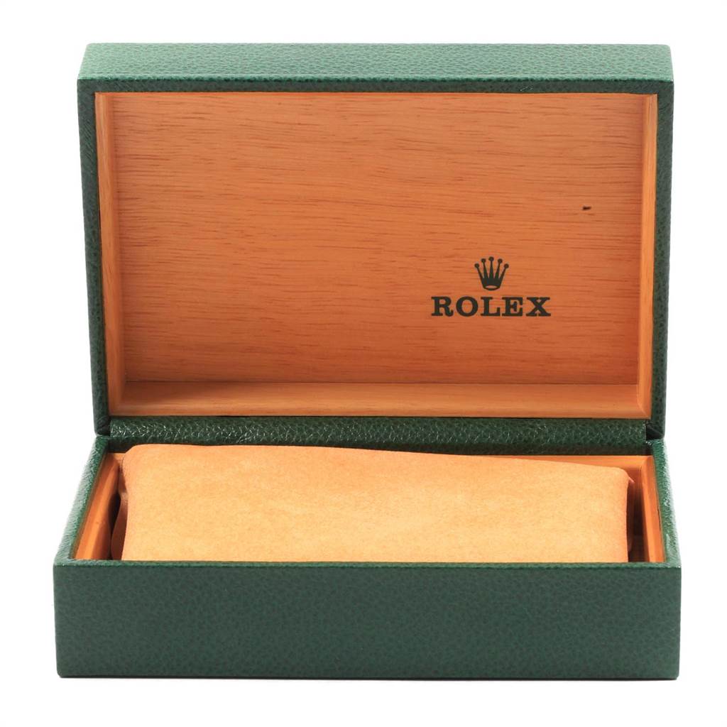 The image shows a Rolex Datejust 16233 Men
s Steel and Gold (two tone) Beige Dial 16233 Men
s Steel and Gold (two tone) Beige Dial watch box, open, displaying the inner cushion and wooden interior.
