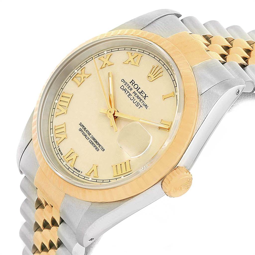 The image shows a close-up, angled view of the Rolex Datejust 16233 Men
s Steel and Gold (two tone) Beige Dial 16233 Men
s Steel and Gold (two tone) Beige Dial watch, highlighting its face, bezel, and part of the bracelet.
