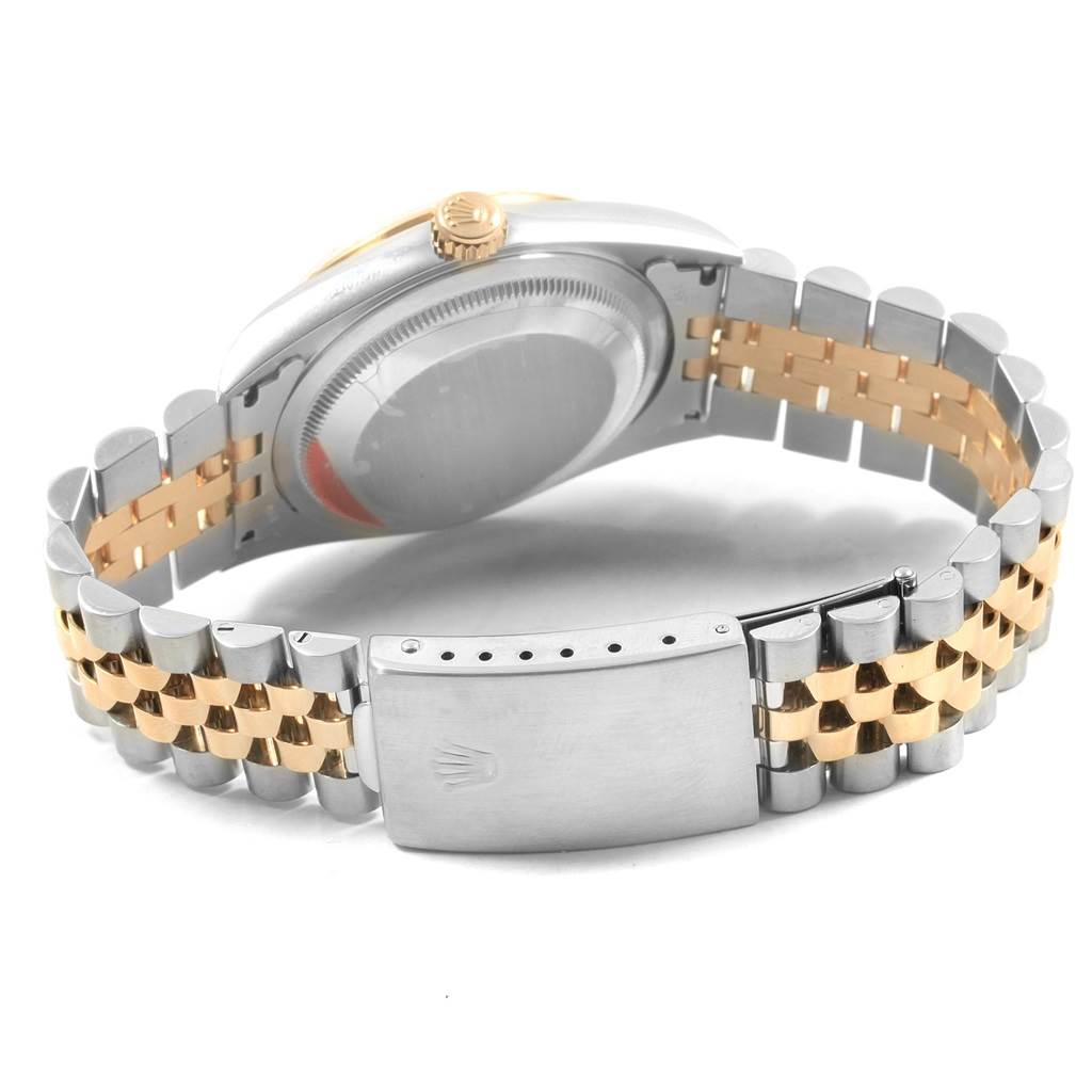 This image shows the backside and bracelet of a Rolex Datejust 16233 Men's Steel and Gold (two tone) White Dial 16233 Men's Steel and Gold (two tone) White Dial watch.