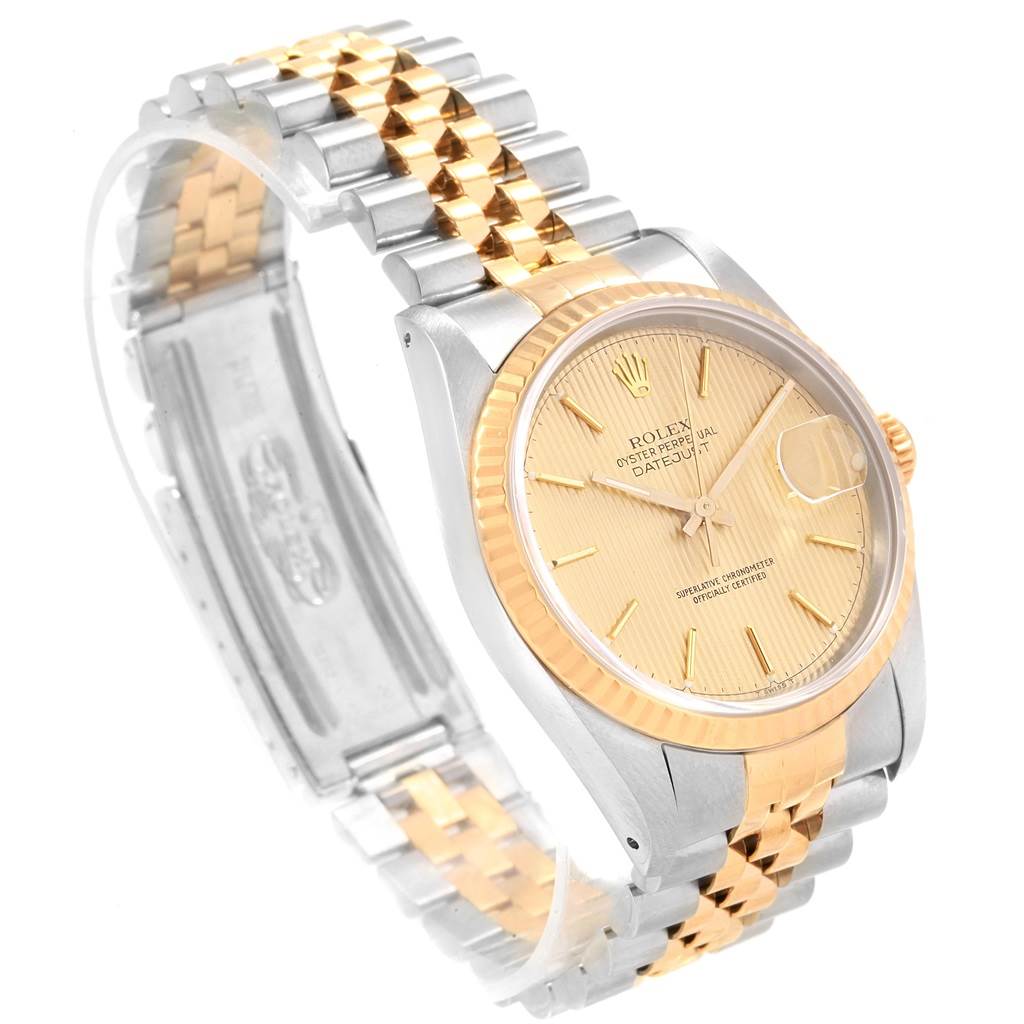 The watch shows a side angle of the Rolex Datejust 16233 Men's Steel and Gold (two tone) Champagne Dial 16233 Men's Steel and Gold (two tone) Champagne Dial model, highlighting its two-tone bracelet, face, and bezel.