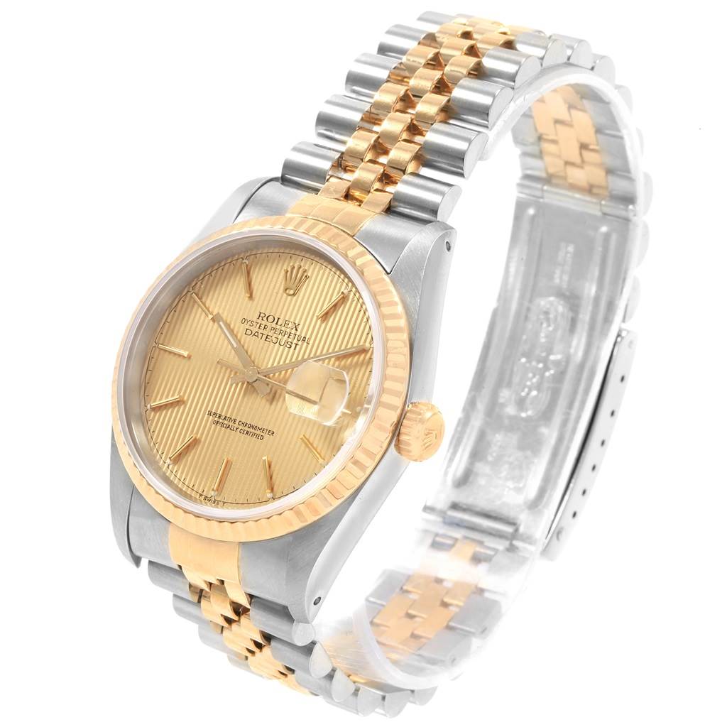 The image shows a gold and silver Rolex Datejust 16233 Men's Steel and Gold (two tone) Champagne Dial 16233 Men's Steel and Gold (two tone) Champagne Dial watch with a jubilee bracelet, viewed from a three-quarter angle.