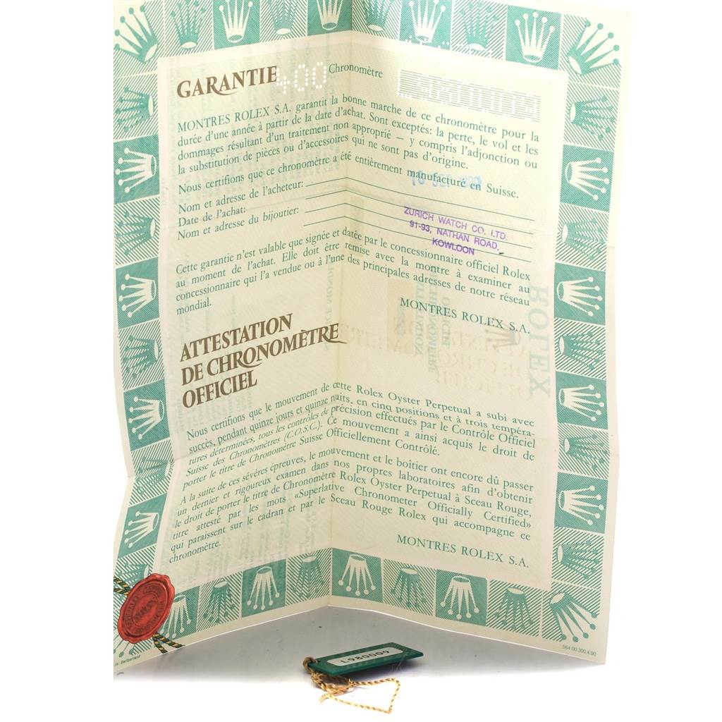 This image shows the certification and warranty documents for a Rolex Datejust 16233 Men's Steel and Gold (two tone) Champagne Dial 16233 Men's Steel and Gold (two tone) Champagne Dial watch.