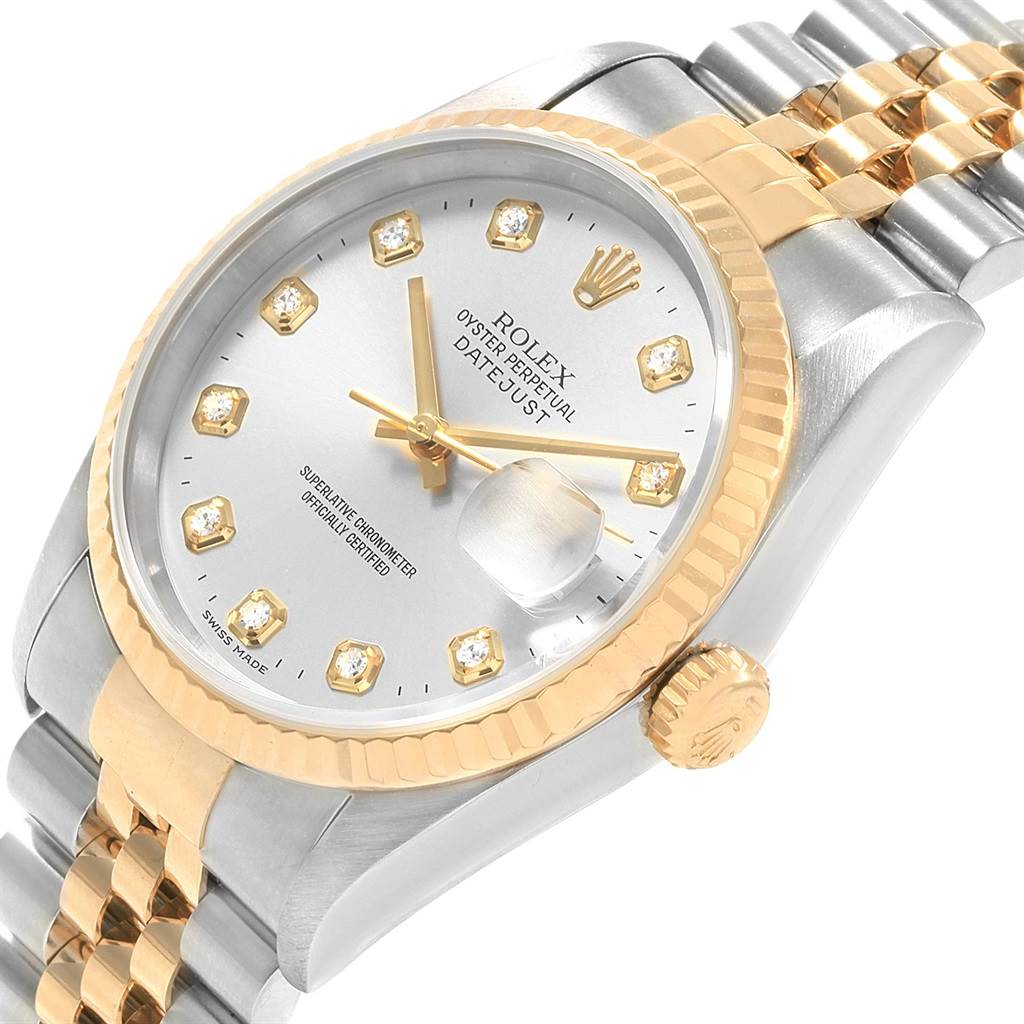 The image shows a close-up angle of a Rolex Datejust 16233 Men's Steel and Gold (two tone) Silver Dial 16233 Men's Steel and Gold (two tone) Silver Dial watch, highlighting its dial, bezel, and part of the two-tone jubilee bracelet.