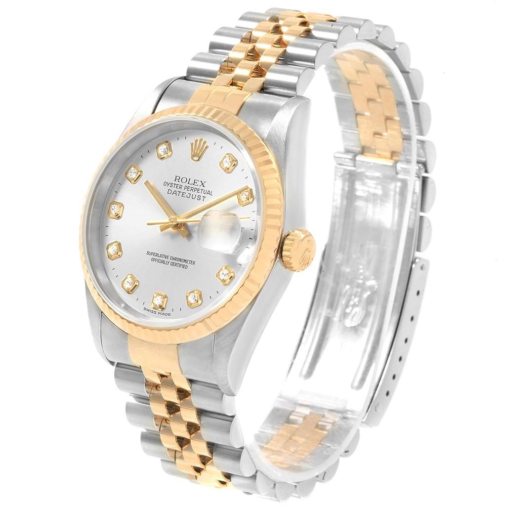 The Rolex Datejust 16233 Men's Steel and Gold (two tone) Silver Dial 16233 Men's Steel and Gold (two tone) Silver Dial watch is shown at an angle, highlighting its face, bezel, and two-tone bracelet.