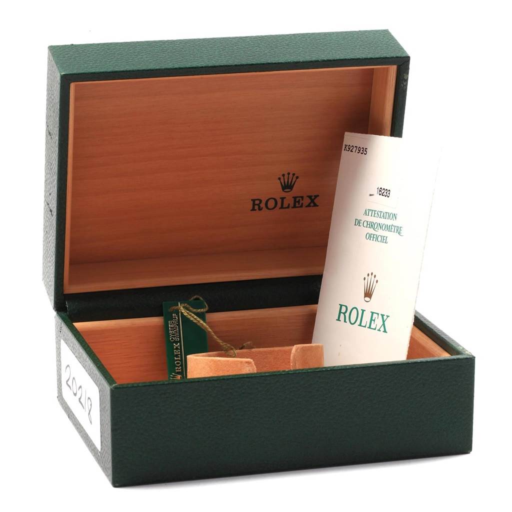 The image shows an open Rolex Datejust 16233 Men
s Steel and Gold (two tone) Black Dial 16233 Men
s Steel and Gold (two tone) Black Dial box with a tag and official chronometer certification document visible inside.