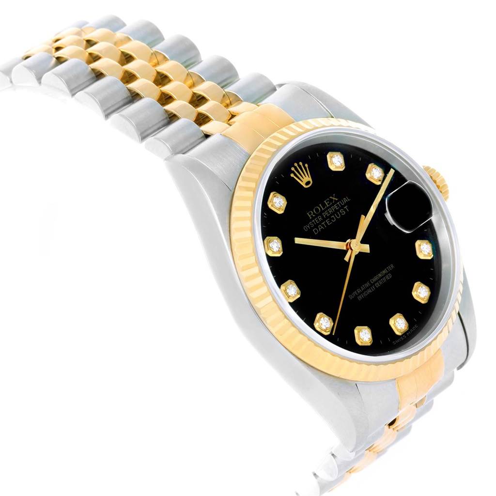 The Rolex Datejust 16233 Men
s Steel and Gold (two tone) Black Dial 16233 Men
s Steel and Gold (two tone) Black Dial watch is shown at an angled view, highlighting its black dial, gold bezel, and two-tone bracelet.