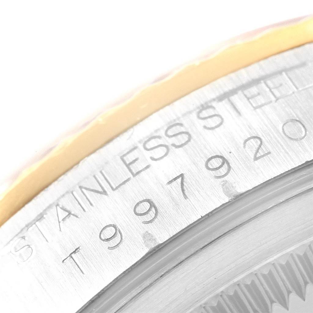 The image displays a close-up of the case back showing the edge details and "STAINLESS STEEL" inscription of a Rolex Datejust 16233 Men's Steel and Gold (two tone) Silver Dial 16233 Men's Steel and Gold (two tone) Silver Dial watch.