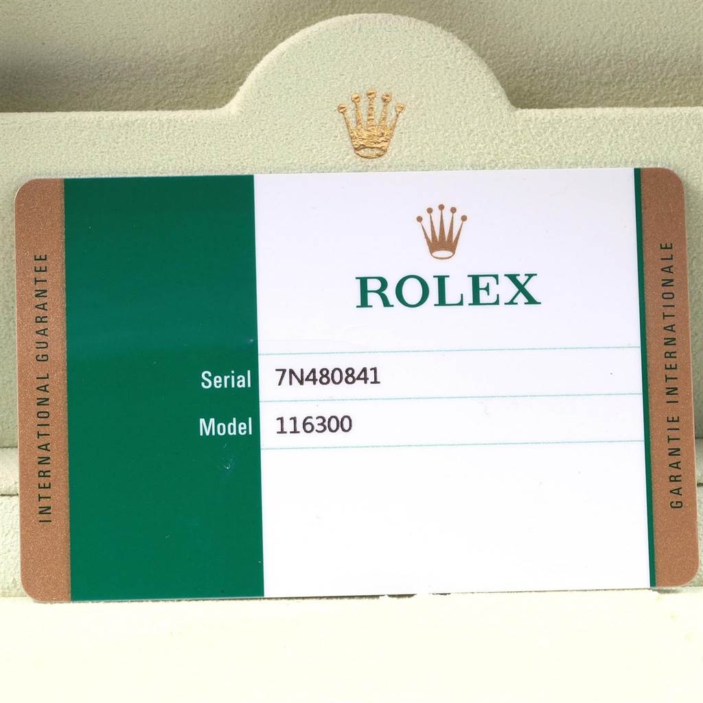 This image shows the guarantee card for a Rolex Datejust 116300 Men's Stainless Steel Blue Dial 116300 Men's Stainless Steel Blue Dial model, displaying the serial and model numbers.