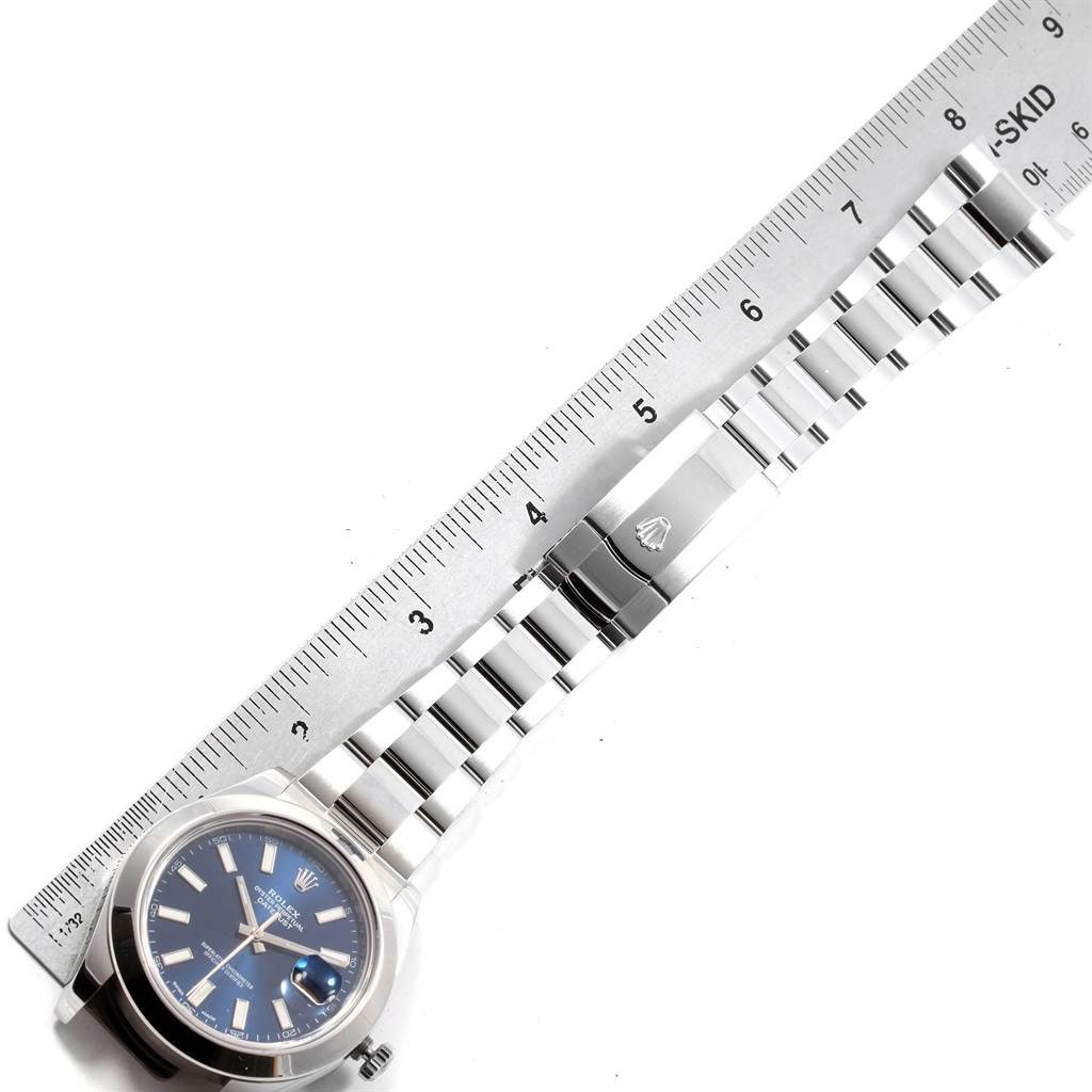 The image shows a Rolex Datejust 116300 Men's Stainless Steel Blue Dial 116300 Men's Stainless Steel Blue Dial watch horizontally, highlighting its face, bezel, and bracelet, measured with a ruler.