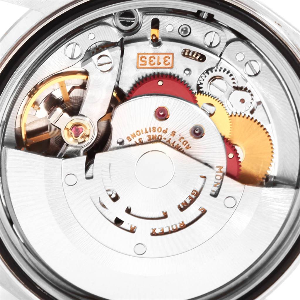 The image shows an internal view of the movement mechanism of a Rolex Datejust 16233 Men's Steel and Gold (two tone) Mother of Pearl Dial 16233 Men's Steel and Gold (two tone) Mother of Pearl Dial watch.