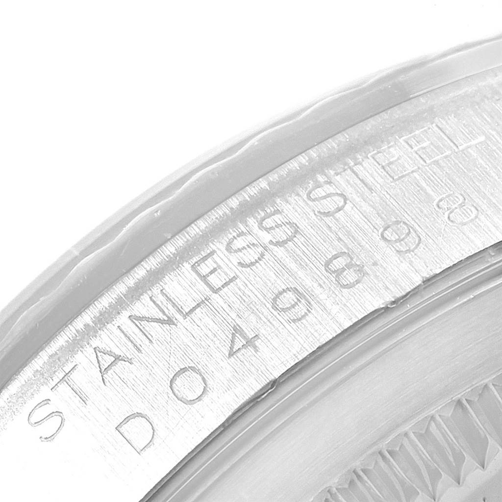The image shows a close-up of the case back and engravings of a Rolex Datejust 16234 Men's Stainless Steel Silver Dial 16234 Men's Stainless Steel Silver Dial watch, highlighting the "STAINLESS STEEL" text.