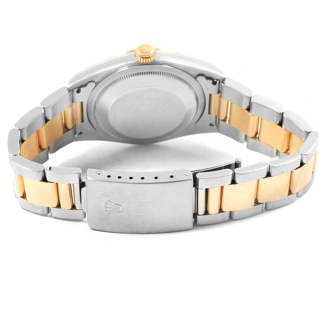 The image shows the back of the Rolex Datejust 16203 Men's Steel and Gold (two tone) White Dial 16203 Men's Steel and Gold (two tone) White Dial watch, highlighting the caseback, bracelet, and clasp.