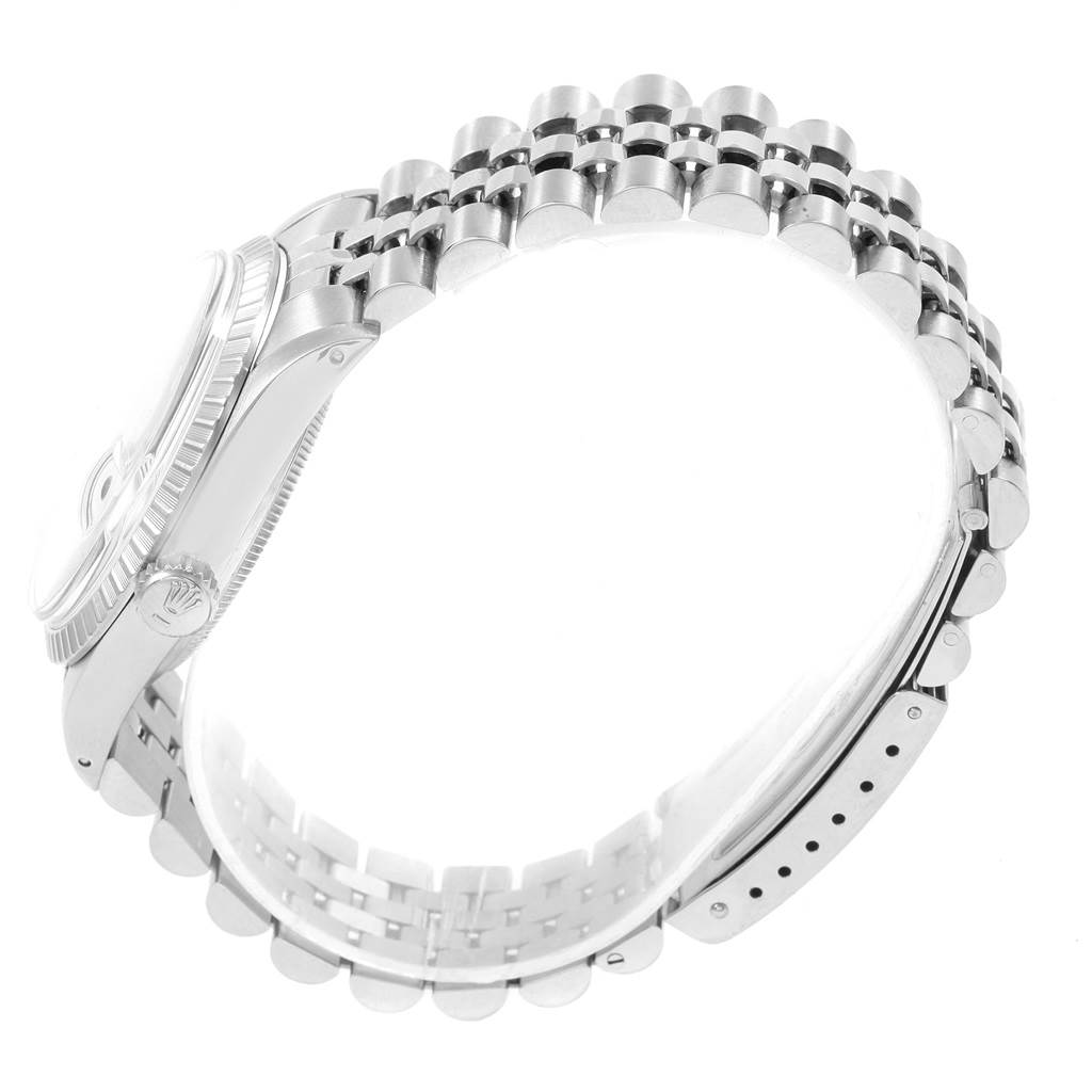 The image shows a side angle of a Rolex Datejust 16030 Men's Stainless Steel Silver Dial 16030 Men's Stainless Steel Silver Dial watch focusing on the case, crown, and Jubilee bracelet.