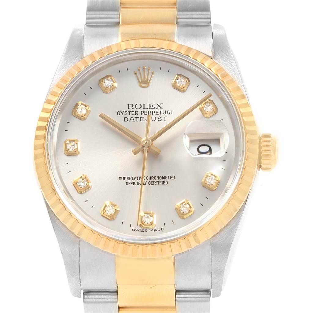 This image shows a front view of a Rolex Datejust 16233 Men's Steel and Gold (two tone) White Dial 16233 Men's Steel and Gold (two tone) White Dial watch, highlighting its face, bezel, and part of the band.