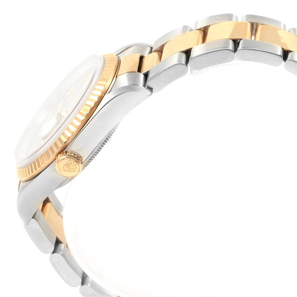 The image shows a side view of the Rolex Datejust 16233 Men's Steel and Gold (two tone) White Dial 16233 Men's Steel and Gold (two tone) White Dial watch, highlighting the crown, case, and two-tone bracelet.