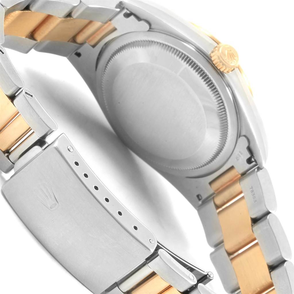 The image shows the back case and bracelet clasp of a Rolex Datejust 16233 Men's Steel and Gold (two tone) White Dial 16233 Men's Steel and Gold (two tone) White Dial watch, highlighting the two-tone metal links.