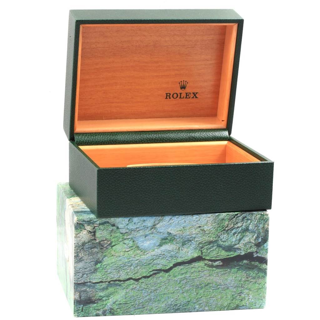 The image shows an open green Rolex Datejust 16233 Men's Steel and Gold (two tone) White Dial 16233 Men's Steel and Gold (two tone) White Dial watch box with a wooden interior and the Rolex logo inside the lid.