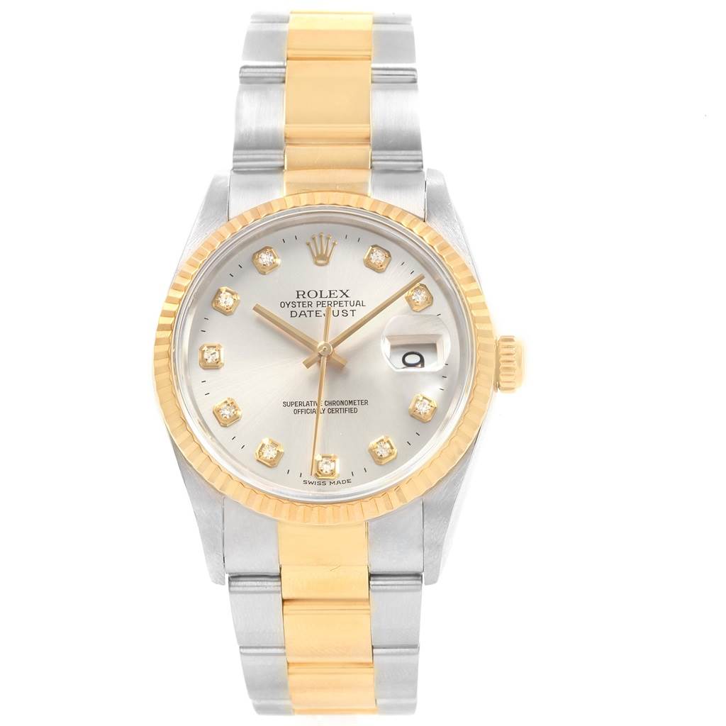 This image shows a frontal view of a Rolex Datejust 16233 Men's Steel and Gold (two tone) White Dial 16233 Men's Steel and Gold (two tone) White Dial watch, highlighting its gold and silver bracelet, dial, and fluted bezel.