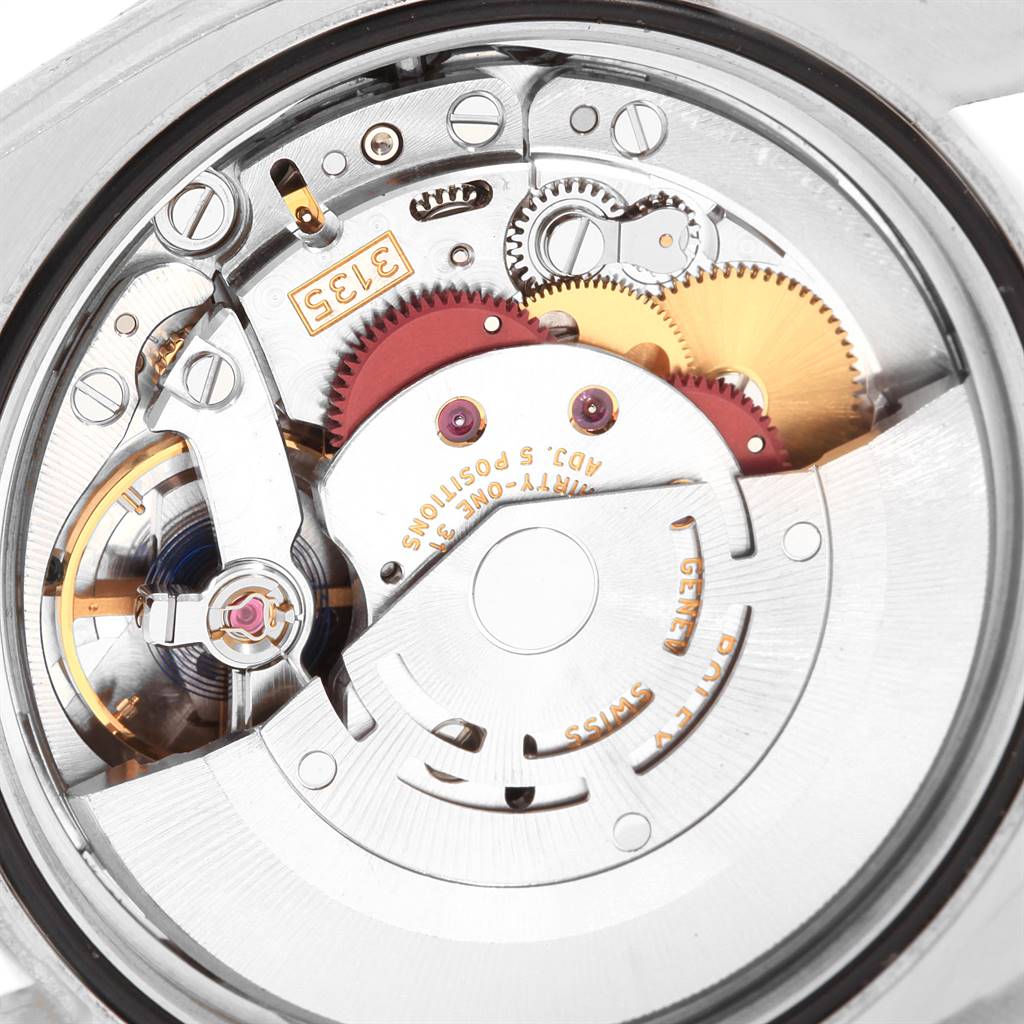 This image shows a close-up view of the movement mechanism of a Rolex Datejust 116244 Men
s Stainless Steel Silver Dial 116244 Men
s Stainless Steel Silver Dial watch.