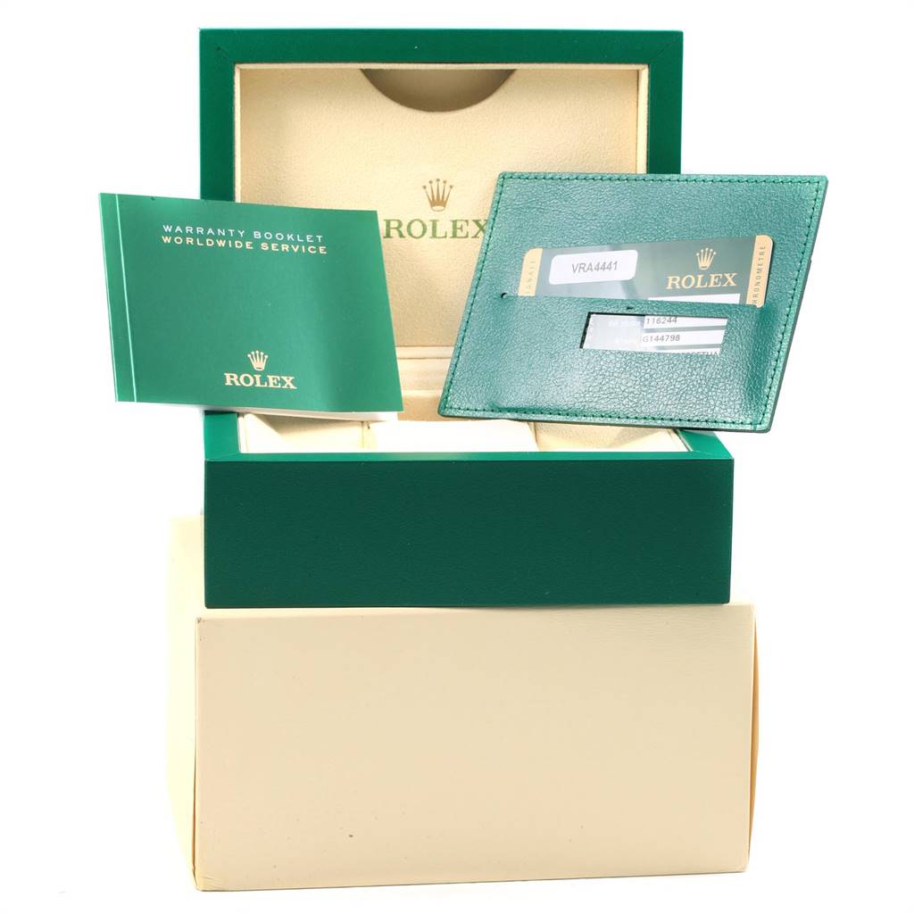 The image shows the box, warranty booklet, and cardholder for a Rolex Datejust 116244 Men
s Stainless Steel Silver Dial 116244 Men
s Stainless Steel Silver Dial.