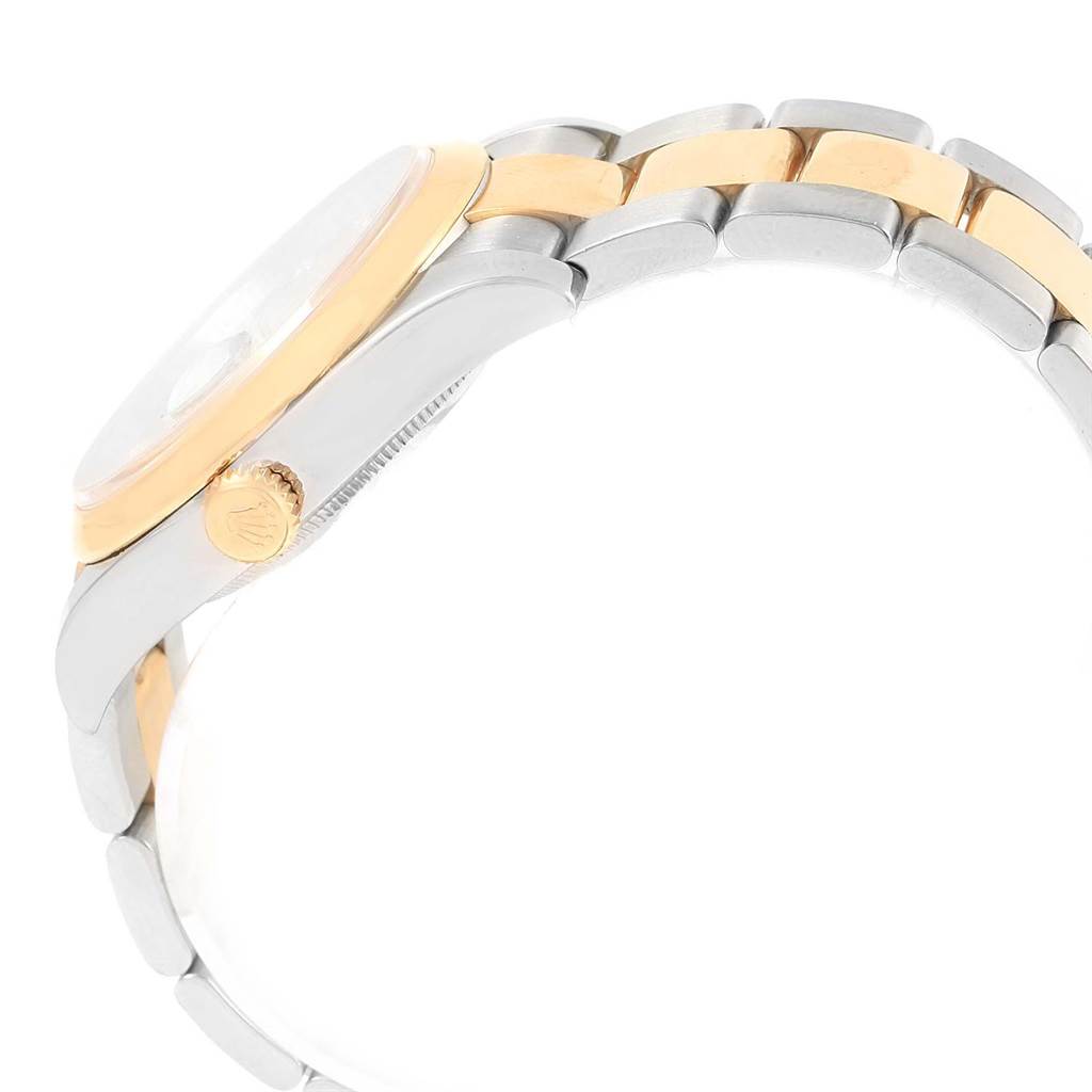 The image shows a side view of the Rolex Datejust 116203 Men's Stainless Steel Champagne Dial 116203 Men's Stainless Steel Champagne Dial watch, highlighting its crown, case, and two-tone bracelet.