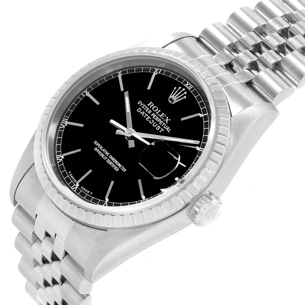 The image shows a close-up, angled view of the Rolex Datejust 16220 Men
s Stainless Steel Black Dial 16220 Men
s Stainless Steel Black Dial model, highlighting its black dial, fluted bezel, and metal bracelet.
