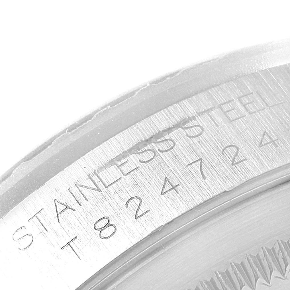 This image shows a close-up view of the stainless steel case back engraving on the Rolex Datejust 16220 Men
s Stainless Steel Black Dial 16220 Men
s Stainless Steel Black Dial watch.