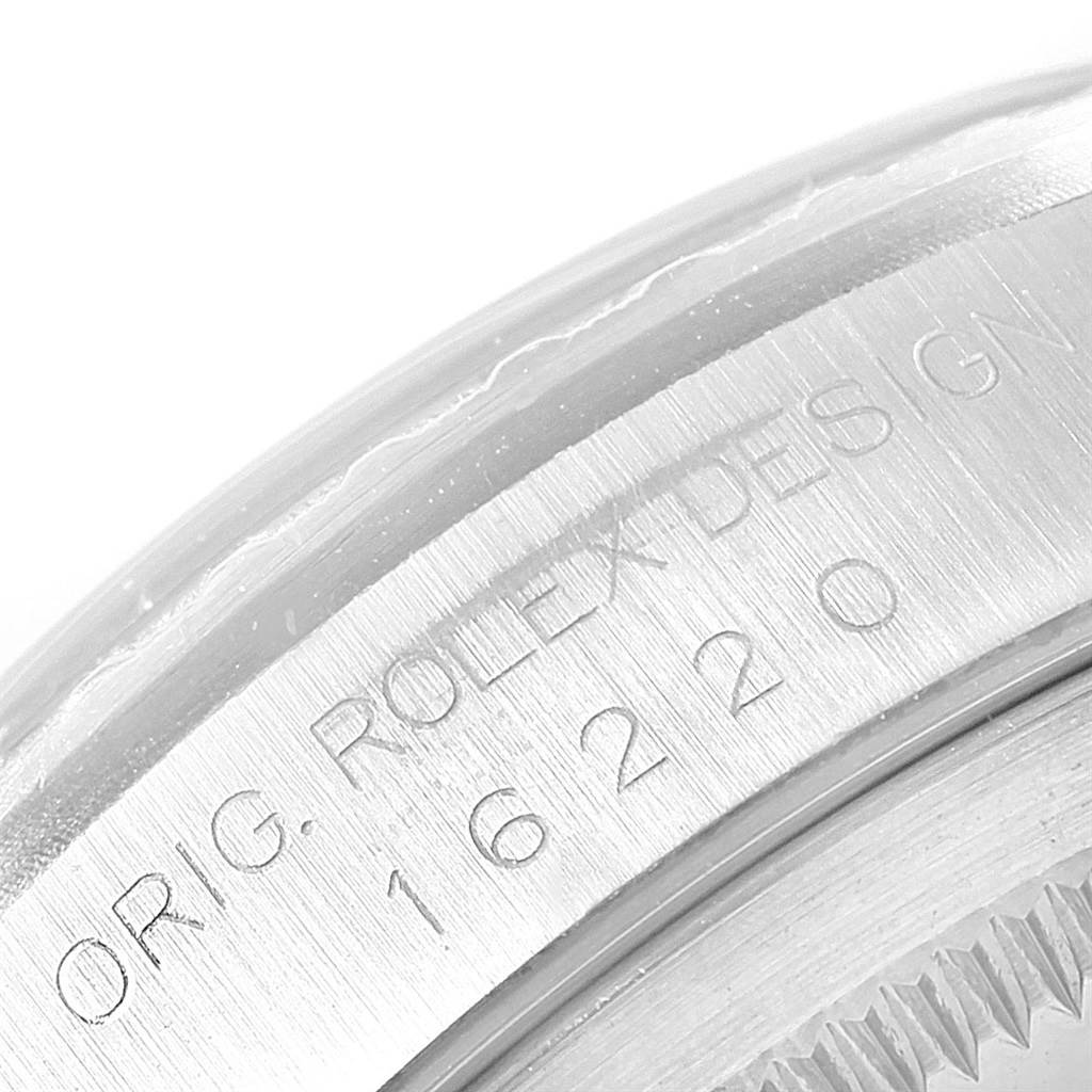 This close-up image shows the engraved side of the Datejust model by Rolex, focusing on the bezel area.