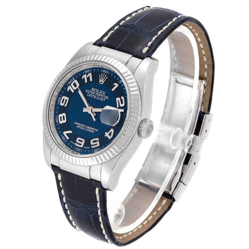 This image shows a Rolex Datejust 116139 Men's White Gold Blue Dial 116139 Men's White Gold Blue Dial watch at an angled side view, highlighting its dial, bezel, crown, and leather strap.