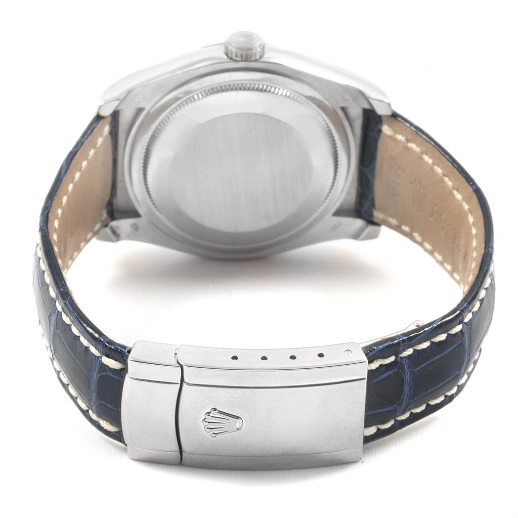 The image shows the back view of a Rolex Datejust 116139 Men's White Gold Blue Dial 116139 Men's White Gold Blue Dial watch, focusing on the case back, crown, and leather strap with clasp.
