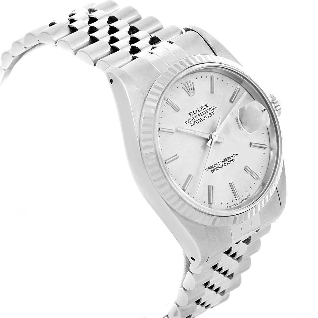 This image shows the face, bezel, and part of the band of a Rolex Datejust 16234 Men's Stainless Steel Silver Dial 16234 Men's Stainless Steel Silver Dial watch at a three-quarter angle.