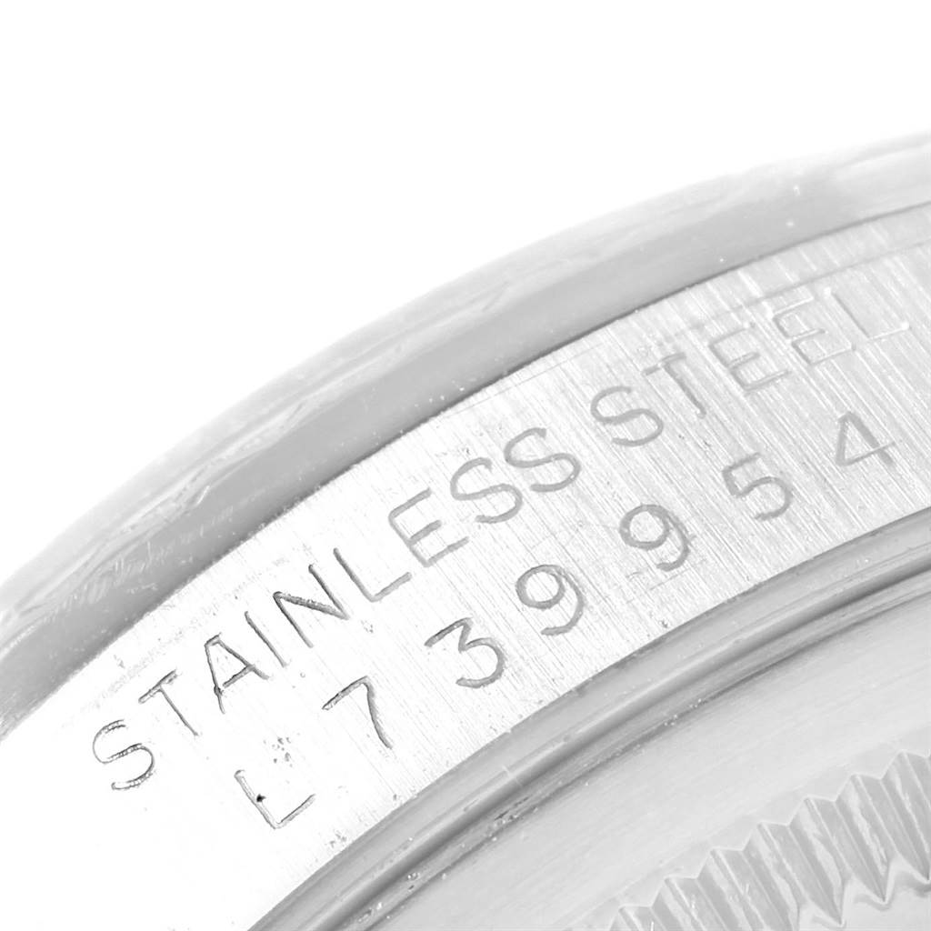 This image shows a close-up of the stainless steel casing with its serial number for a Rolex Datejust 16234 Men's Stainless Steel Silver Dial 16234 Men's Stainless Steel Silver Dial model watch.