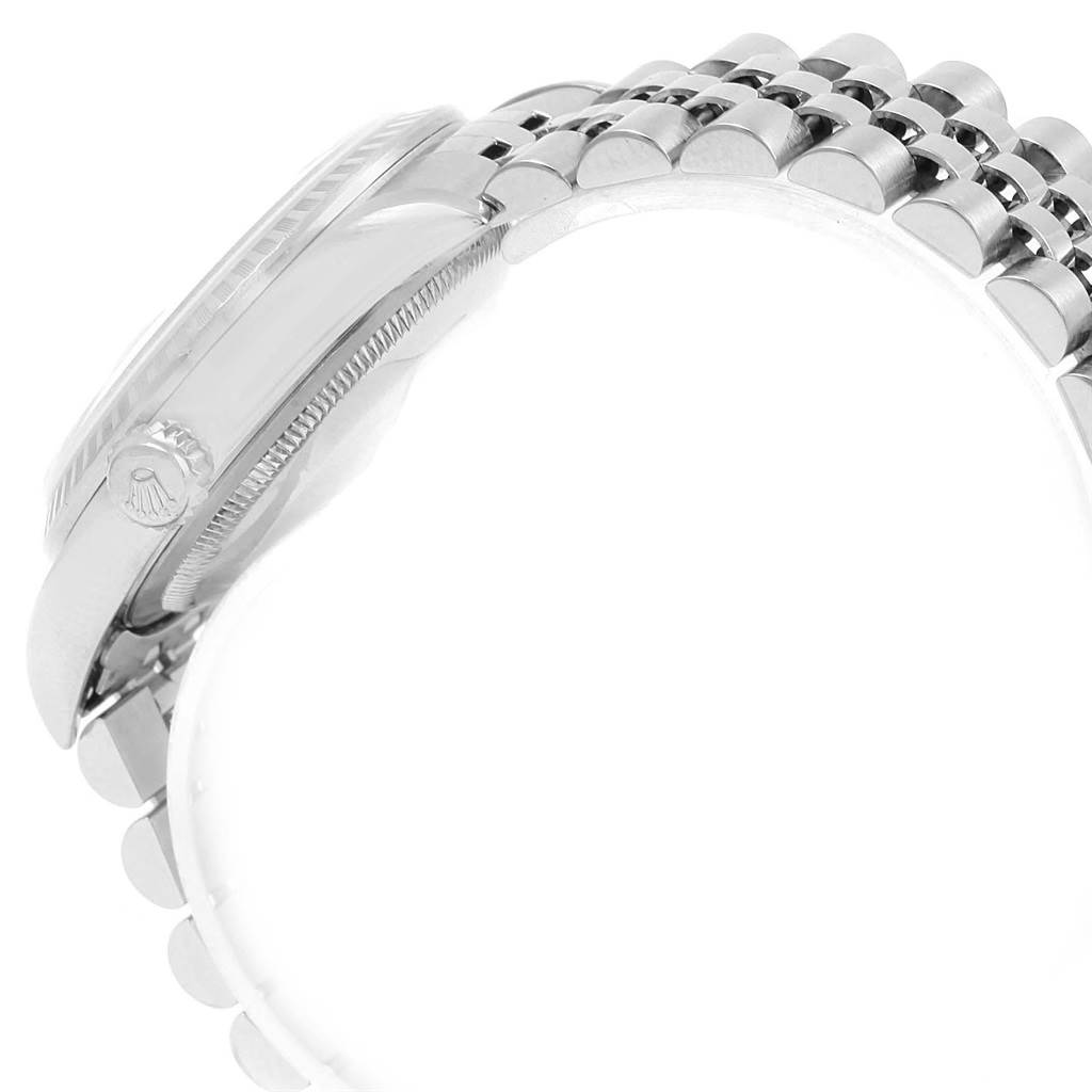 The image shows the side view of the case and bracelet of a Rolex Datejust 16220 Men
s Stainless Steel Blue Dial 16220 Men
s Stainless Steel Blue Dial watch, focusing on the crown and the links.