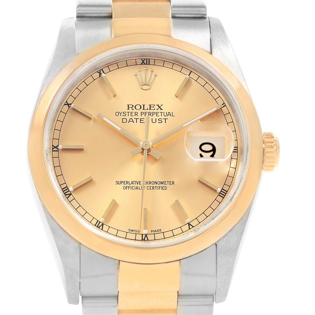 This is a front-facing view of a Rolex Datejust 20413 Men's Steel and Gold (two tone) Champagne Dial 20413 Men's Steel and Gold (two tone) Champagne Dial watch showing the dial, hands, date window, and part of the bracelet.