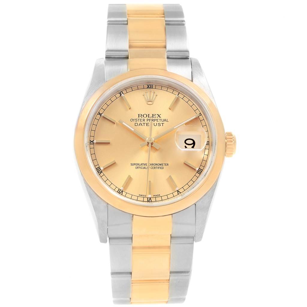 This image shows the front face and bracelet of the Rolex Datejust 20413 Men's Steel and Gold (two tone) Champagne Dial 20413 Men's Steel and Gold (two tone) Champagne Dial watch, displaying its gold dial, date window, and two-tone bracelet.