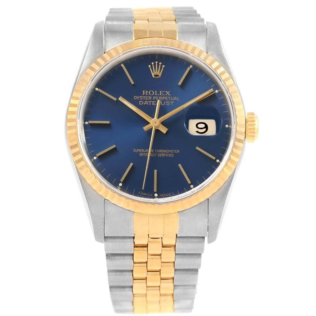 The image shows a Rolex Datejust 16233 Men
s Steel and Gold (two tone) Blue Dial 16233 Men
s Steel and Gold (two tone) Blue Dial watch with a blue dial, gold fluted bezel, and a two-tone bracelet from a front-facing angle.