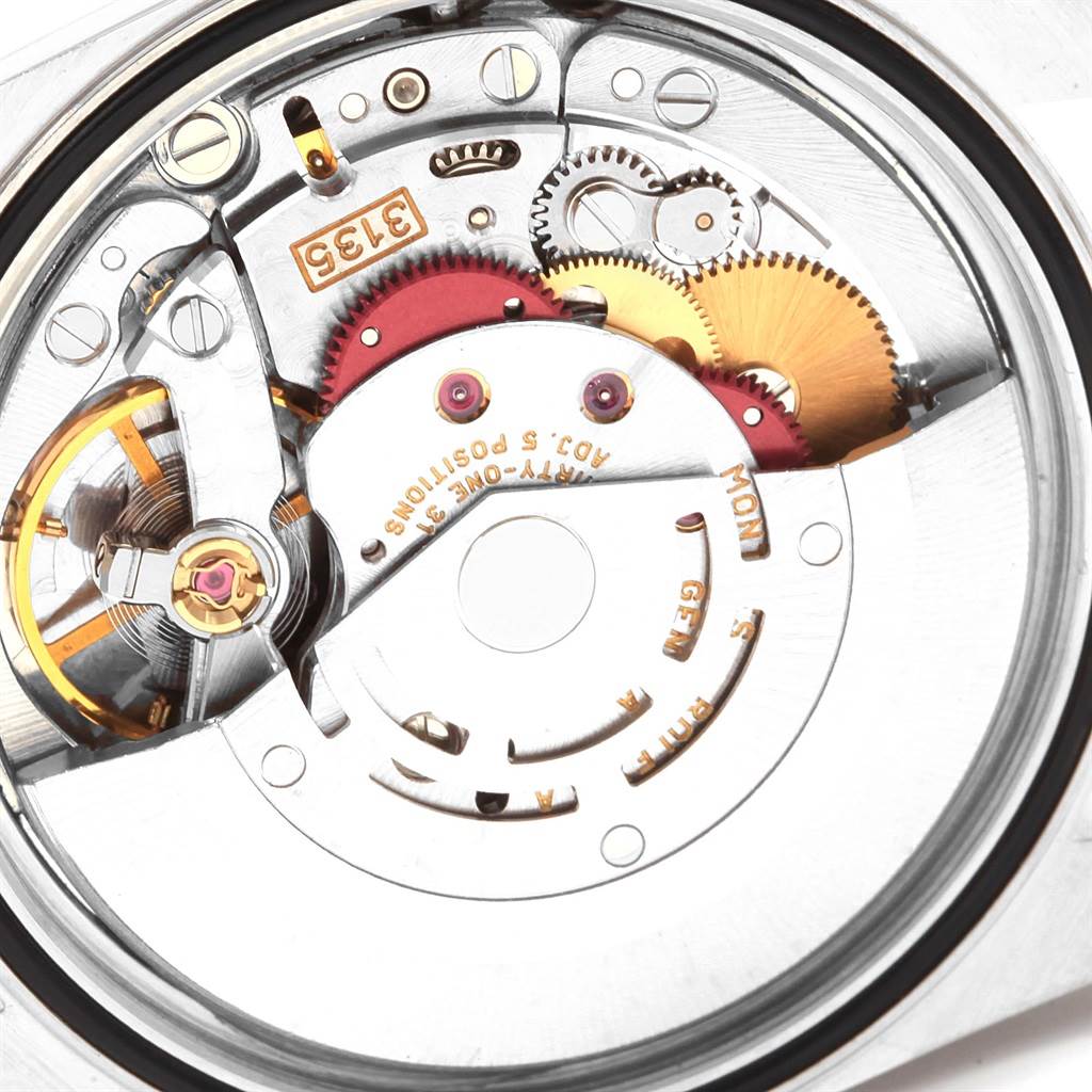 The image shows the internal movement mechanisms of a Rolex Datejust 16233 Men
s Steel and Gold (two tone) Blue Dial 16233 Men
s Steel and Gold (two tone) Blue Dial watch from a back angle.