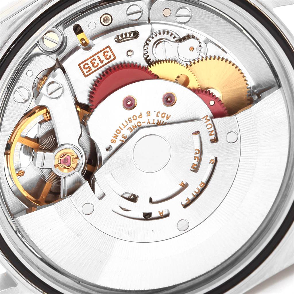 This image shows the inner mechanical movement of a Rolex Datejust 16203 Men's Steel and Gold (two tone) Grey Dial 16203 Men's Steel and Gold (two tone) Grey Dial watch, highlighting gears and components.