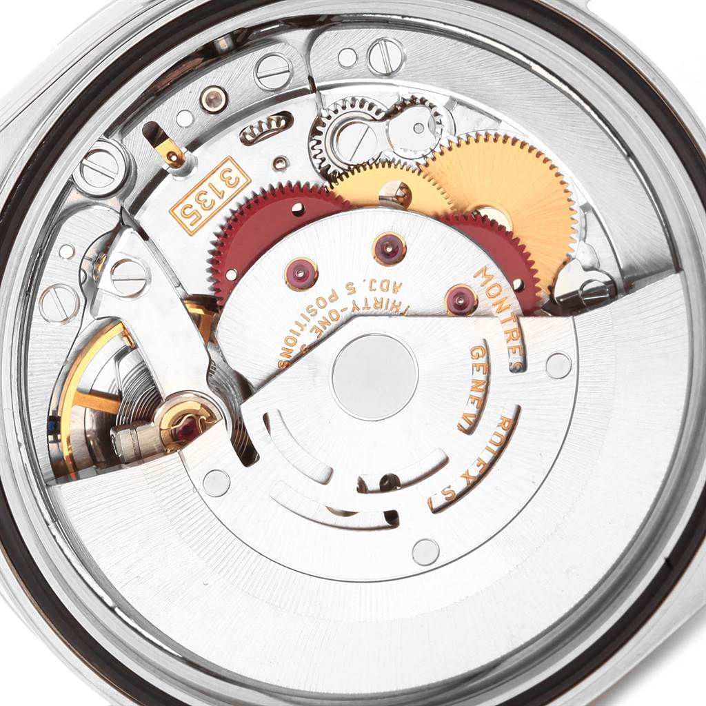 This image shows the intricate internal mechanics of a Rolex Datejust 16234 Men's Stainless Steel White Dial 16234 Men's Stainless Steel White Dial watch, highlighting gears and the movement mechanisms.