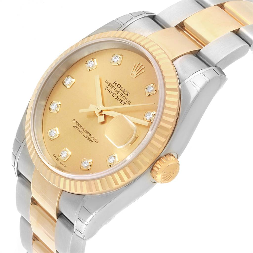 This image shows a close-up angle of the Rolex Datejust 116233 Men's Steel and Gold (two tone) Champagne Dial 116233 Men's Steel and Gold (two tone) Champagne Dial model, highlighting its face, bezel, crown, and part of the bracelet.