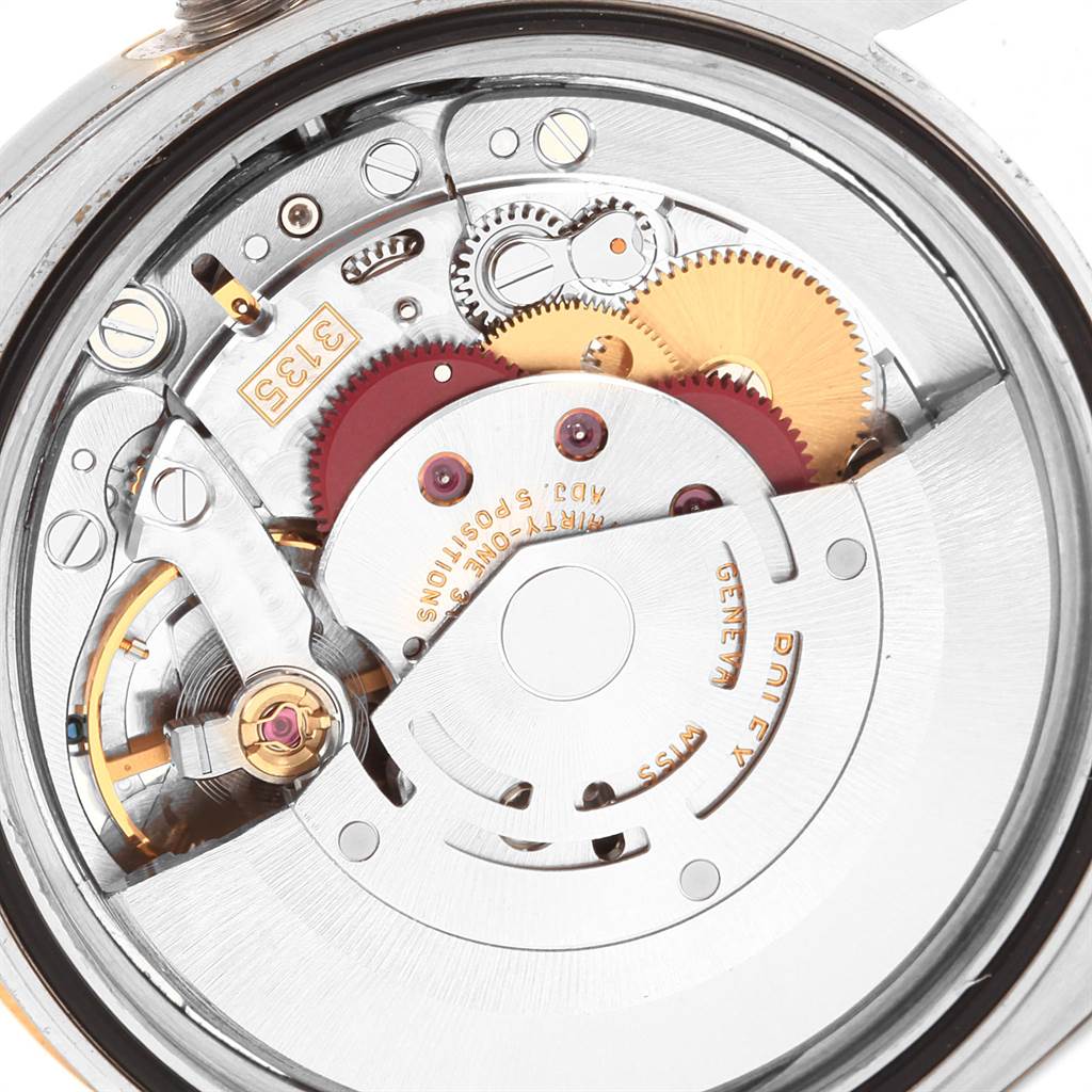 The image shows the inner mechanical movement of the Rolex Datejust 116233 Men's Steel and Gold (two tone) Champagne Dial 116233 Men's Steel and Gold (two tone) Champagne Dial watch, viewed from the back.
