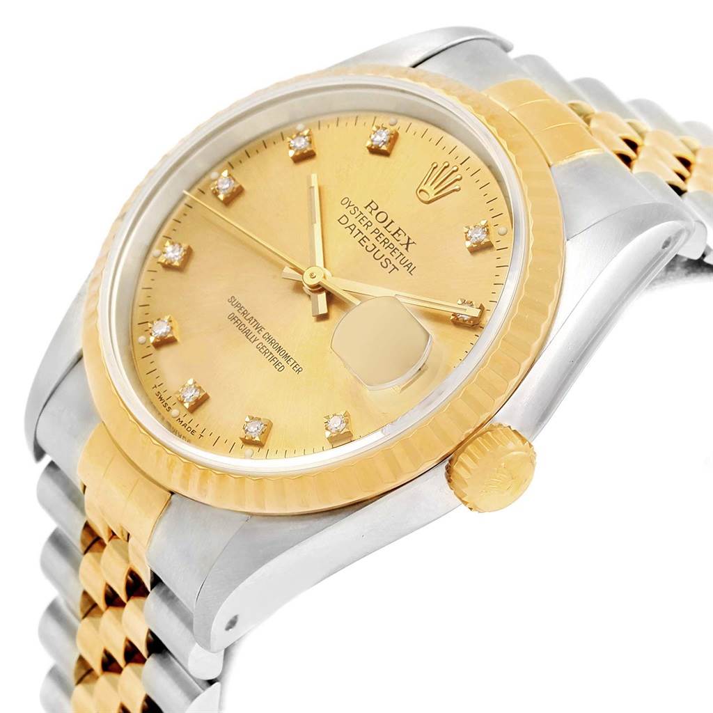 This Rolex Datejust 16233 Men's Steel and Gold (two tone) Champagne Dial 16233 Men's Steel and Gold (two tone) Champagne Dial watch is shown at a slight angle, highlighting its gold dial, diamond hour markers, fluted bezel, crown, and two-tone jubilee bracelet.