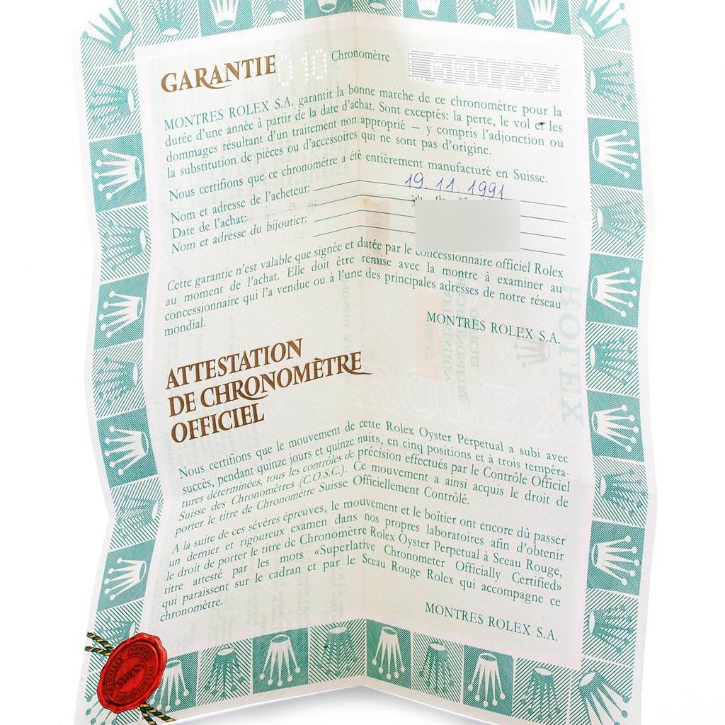 This image shows a Rolex Datejust 16233 Men's Steel and Gold (two tone) Champagne Dial 16233 Men's Steel and Gold (two tone) Champagne Dial warranty certificate from a top-down angle.