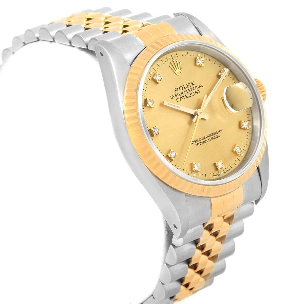 This image shows a side angle of a Rolex Datejust 16233 Men's Steel and Gold (two tone) Champagne Dial 16233 Men's Steel and Gold (two tone) Champagne Dial watch, highlighting its gold dial, bezel, and two-tone bracelet.