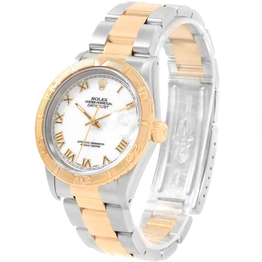 The image shows a Rolex Datejust 16263 Men
s Steel and Gold (two tone) White Dial 16263 Men
s Steel and Gold (two tone) White Dial watch from a front angle, displaying the face, bezel, crown, and part of the bracelet.