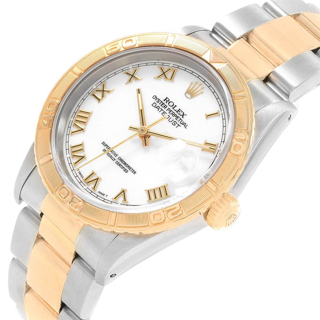 The image shows a Rolex Datejust 16263 Men
s Steel and Gold (two tone) White Dial 16263 Men
s Steel and Gold (two tone) White Dial watch from a three-quarter angle, displaying the face, gold bezel, case, and part of the metal bracelet.