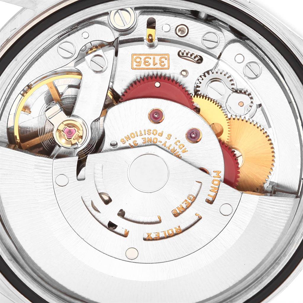 This image shows the intricate movement mechanism of a Rolex Datejust 16234 Men
s Stainless Steel White Dial 16234 Men
s Stainless Steel White Dial watch
s internal parts.