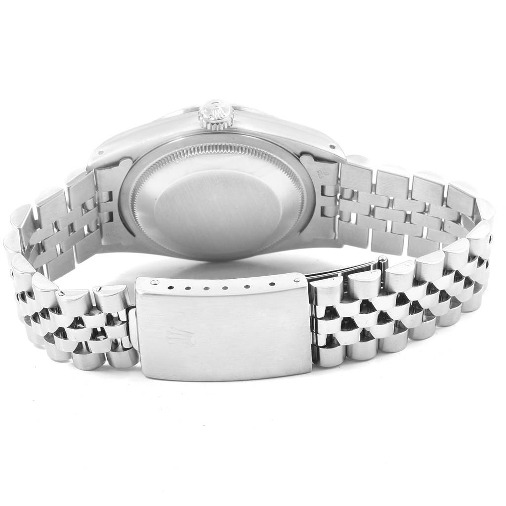 The image shows the back view of a Rolex Datejust 16234 Men
s Stainless Steel White Dial 16234 Men
s Stainless Steel White Dial watch, highlighting the case back and bracelet clasp.