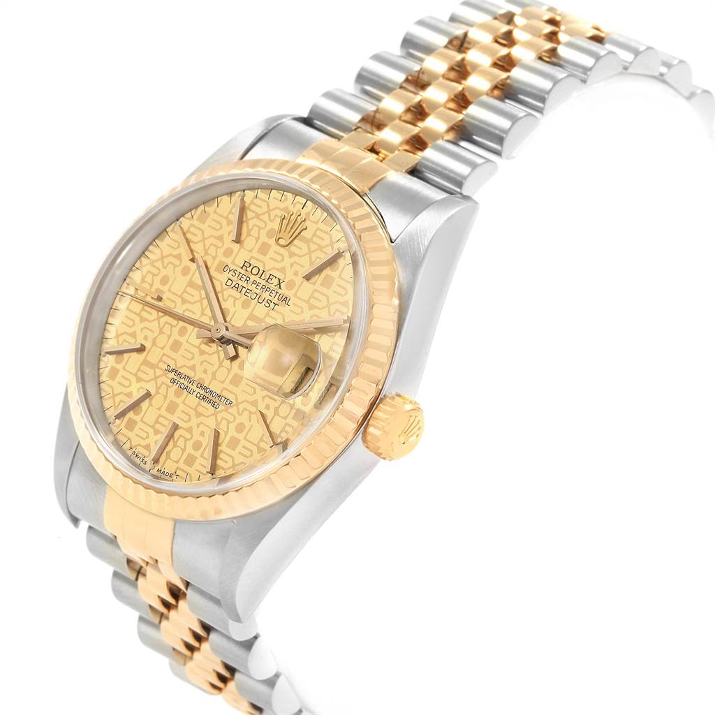 The image shows a partial side view of a Rolex Datejust 16233 Men
s Steel and Gold (two tone) Champagne Dial 16233 Men
s Steel and Gold (two tone) Champagne Dial watch, featuring its bezel, crown, and two-tone bracelet.