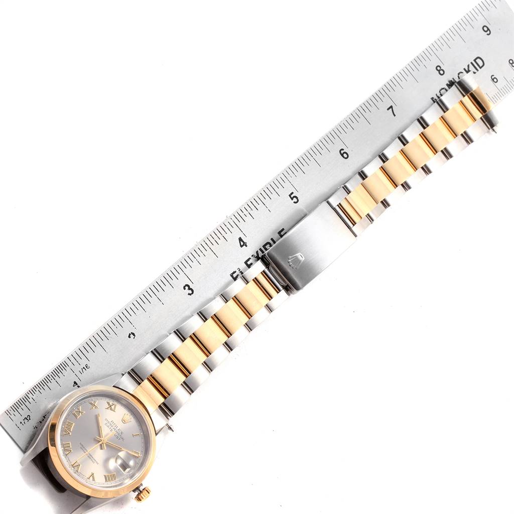 The image shows a Rolex Datejust 16203 Men's Steel and Gold (two tone) Grey Dial 16203 Men's Steel and Gold (two tone) Grey Dial watch laid flat with a flexible ruler, displaying the face and bracelet in a top-down view.